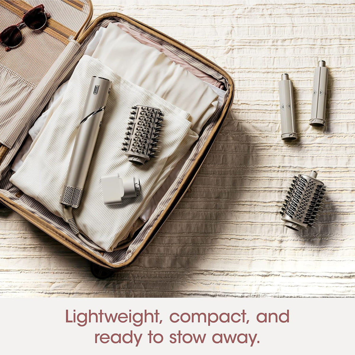 Powerful hair dryer and multi-functional styling tool, featuring automatic hair curler, paddle brush, oval brush, concentrator accessory and stones.